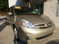 2010 Desert Sand Mica Toyota Sienna XLE  photo #7