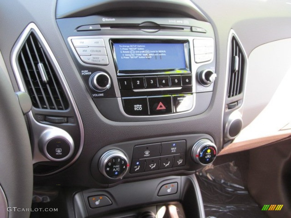 2013 Hyundai Tucson GLS AWD Controls Photo #69712092