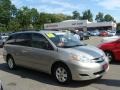 2010 Silver Shadow Pearl Toyota Sienna LE  photo #1