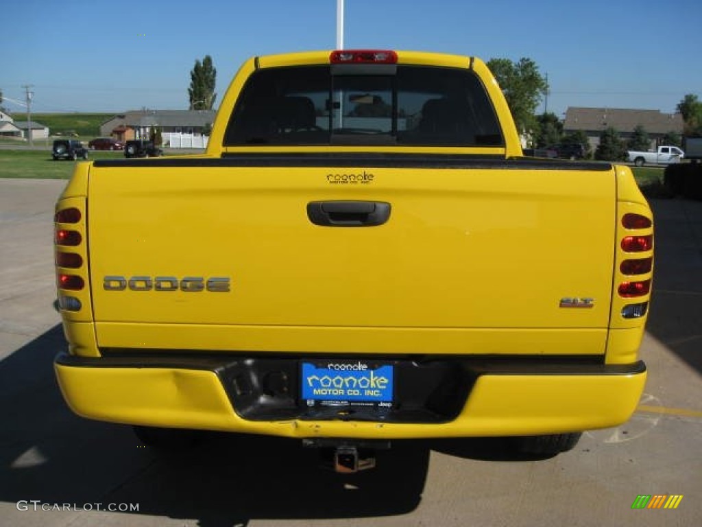 2004 Ram 1500 SLT Quad Cab - Solar Yellow / Dark Slate Gray photo #17