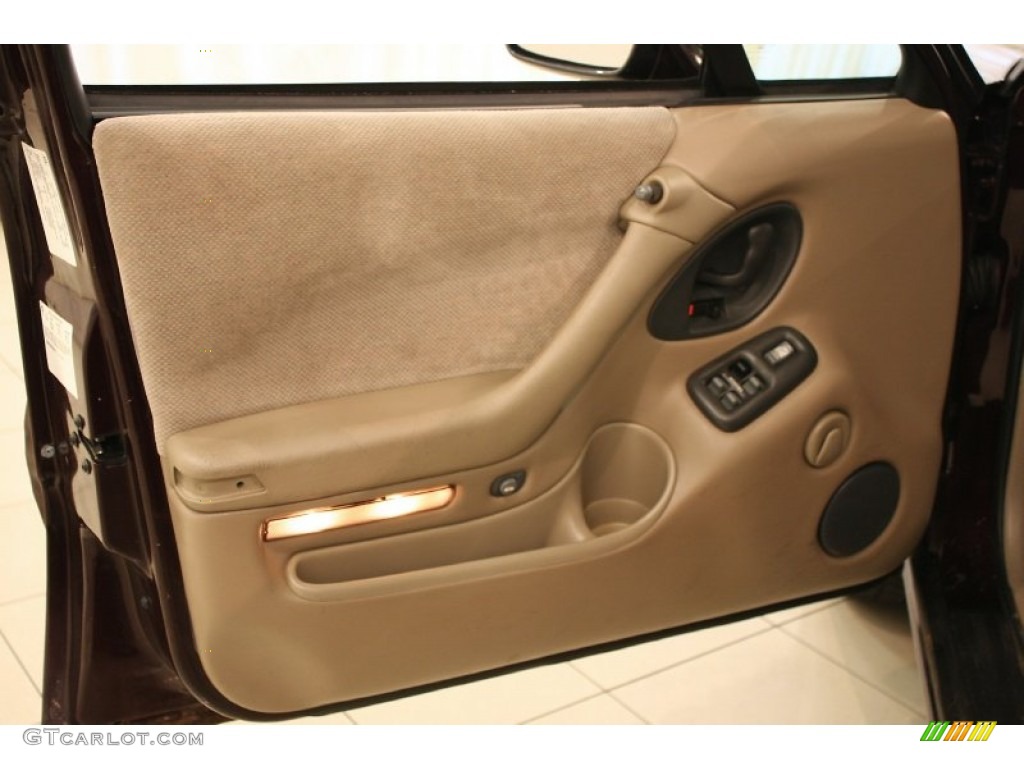 1999 Bonneville SE - Dark Cherry Metallic / Camel photo #5