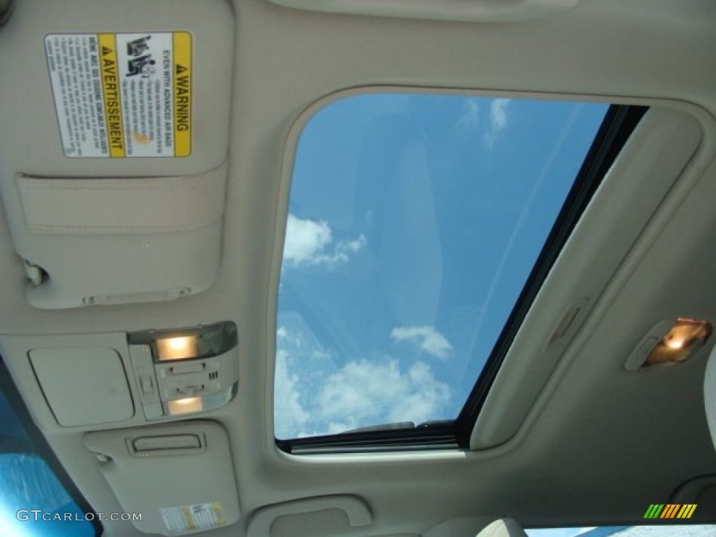 2010 Outback 2.5i Premium Wagon - Crystal Black Silica / Warm Ivory photo #10