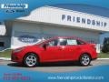 2013 Race Red Ford Focus SE Sedan  photo #1