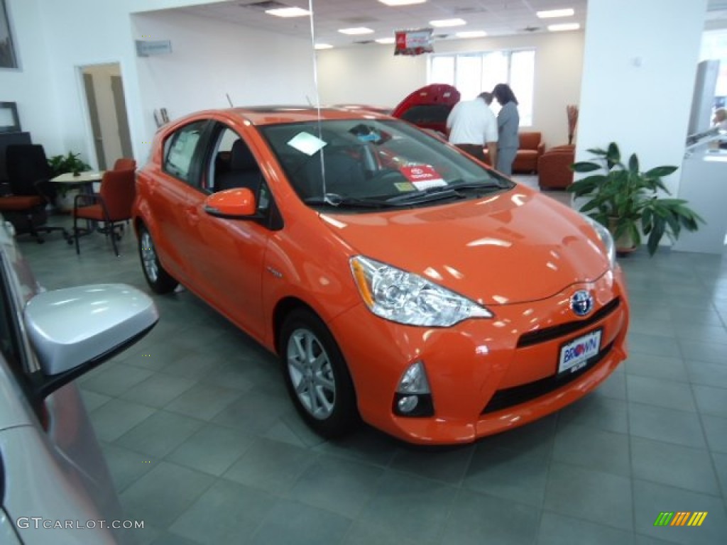 2012 Prius c Hybrid Four - Habanero / Black photo #1