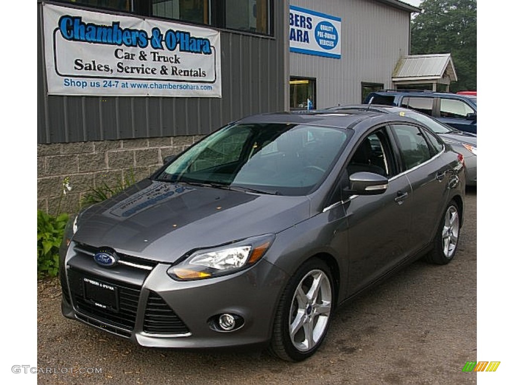 2012 Focus Titanium Sedan - Sterling Grey Metallic / Charcoal Black Leather photo #1