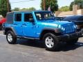 2010 Surf Blue Pearl Jeep Wrangler Unlimited Islander Edition 4x4  photo #2