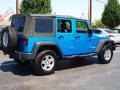 2010 Surf Blue Pearl Jeep Wrangler Unlimited Islander Edition 4x4  photo #3