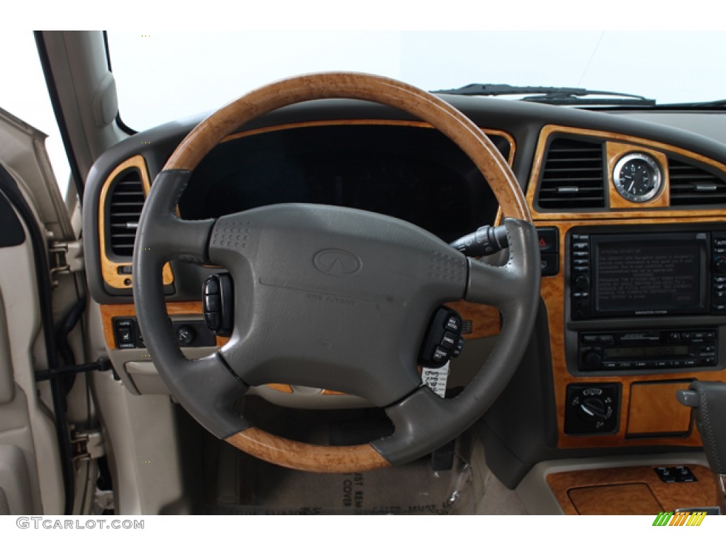 2001 Infiniti QX4 4x4 Stone Beige Steering Wheel Photo #69873886