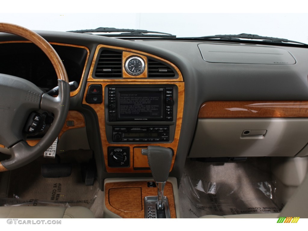 2001 QX4 4x4 - Tuscan Beige Metallic / Stone Beige photo #9