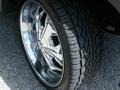 2004 Ford Explorer Sport Trac XLT 4x4 Wheel and Tire Photo