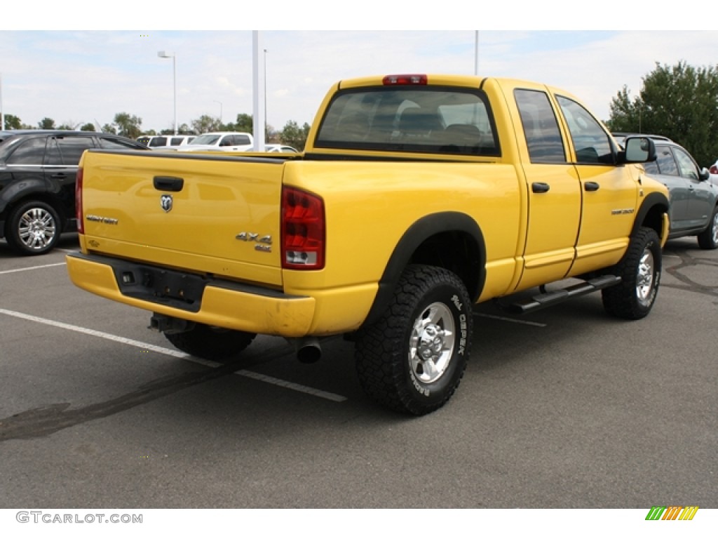 Solar Yellow 2005 Dodge Ram 2500 SLT Quad Cab 4x4 Exterior Photo #69891208
