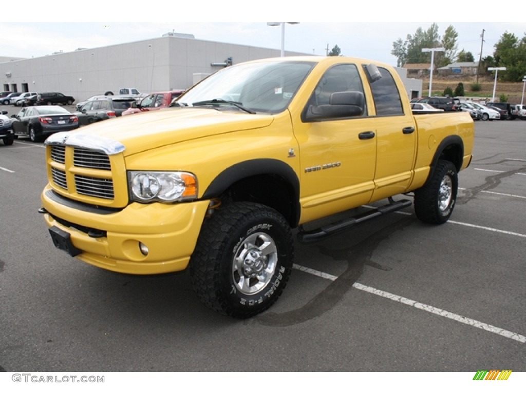 Solar Yellow 2005 Dodge Ram 2500 SLT Quad Cab 4x4 Exterior Photo #69891229