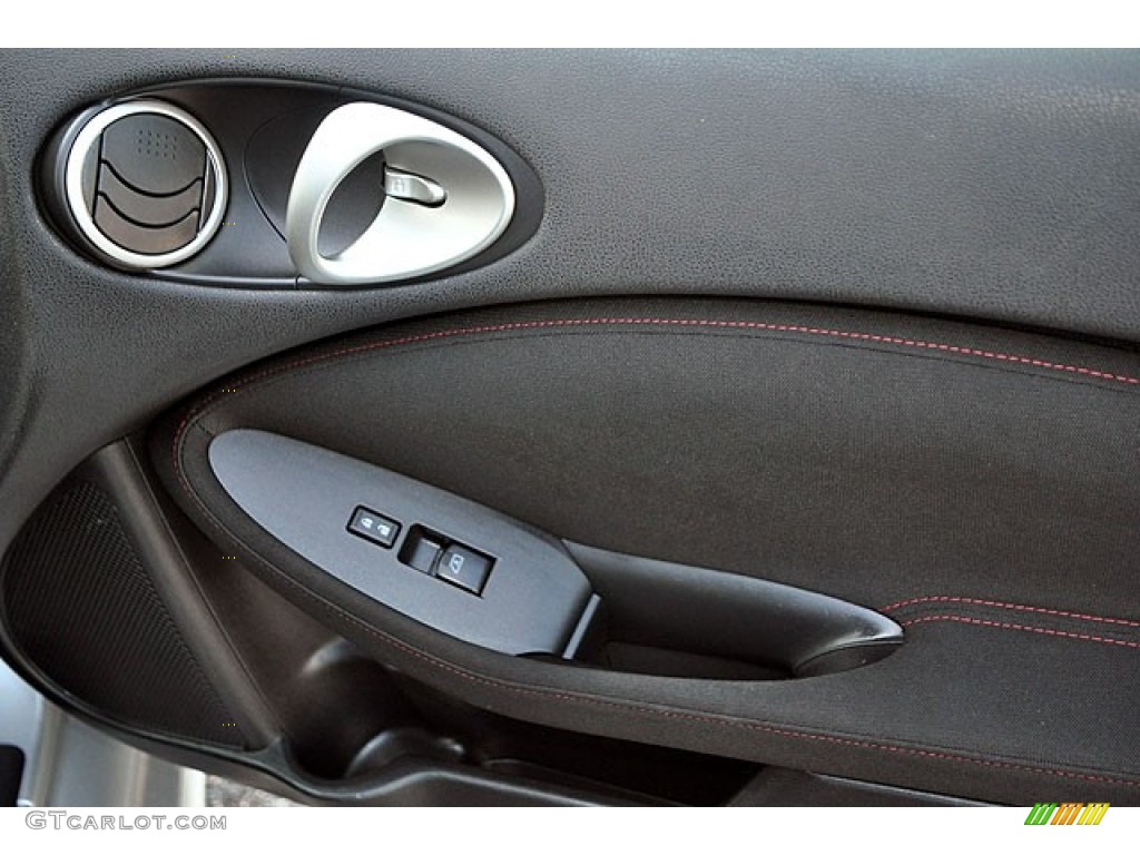 2010 Nissan 370Z NISMO Coupe NISMO Black/Red Cloth Door Panel Photo #69909365