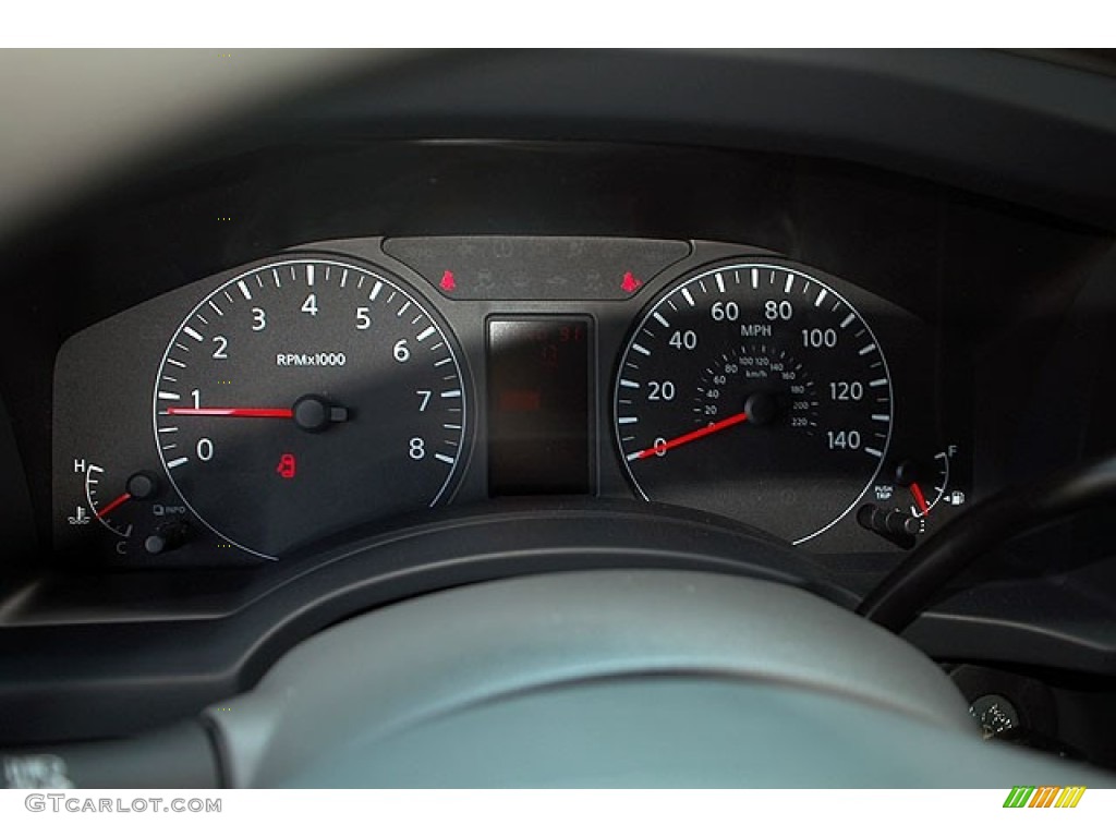 2012 Nissan NV 1500 S Gauges Photos