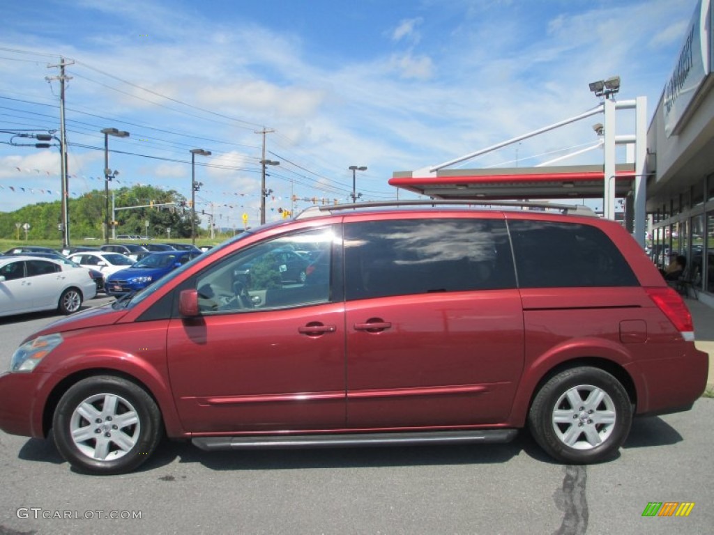 Autumn Red Metallic Nissan Quest