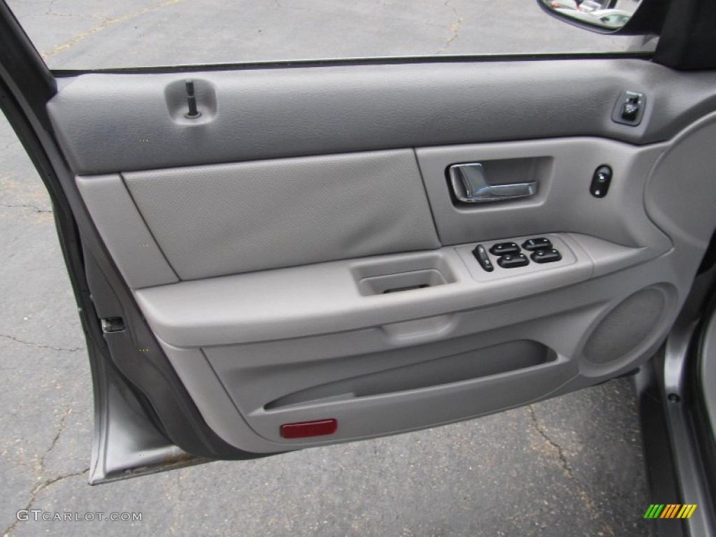 2003 Ford Taurus SE Wagon Medium Graphite Door Panel Photo #69965101