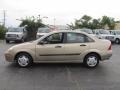 2000 Fort Knox Gold Metallic Ford Focus LX Sedan  photo #2