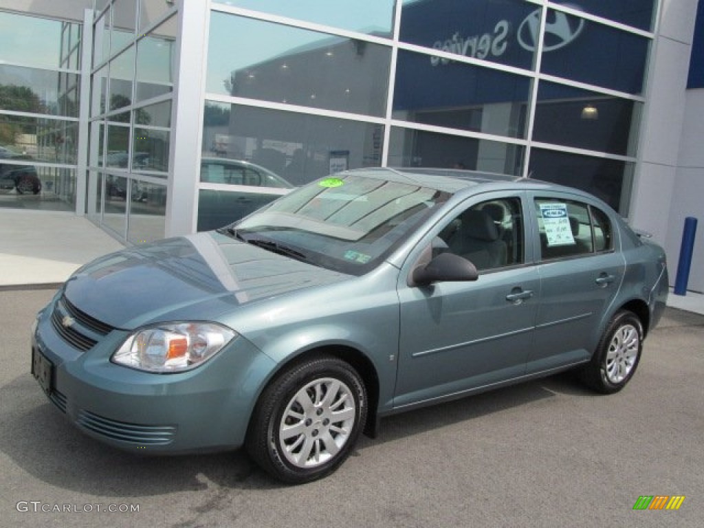 2009 Cobalt LS Sedan - Silver Moss Metallic / Gray photo #1