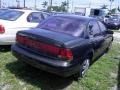 1999 Dark Green Saturn S Series SL2 Sedan  photo #4