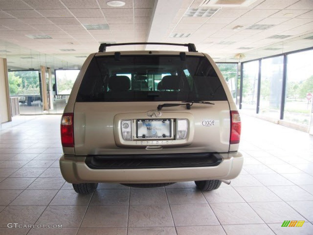 2002 QX4 4x4 - Golden Sand Metallic / Stone Beige photo #6