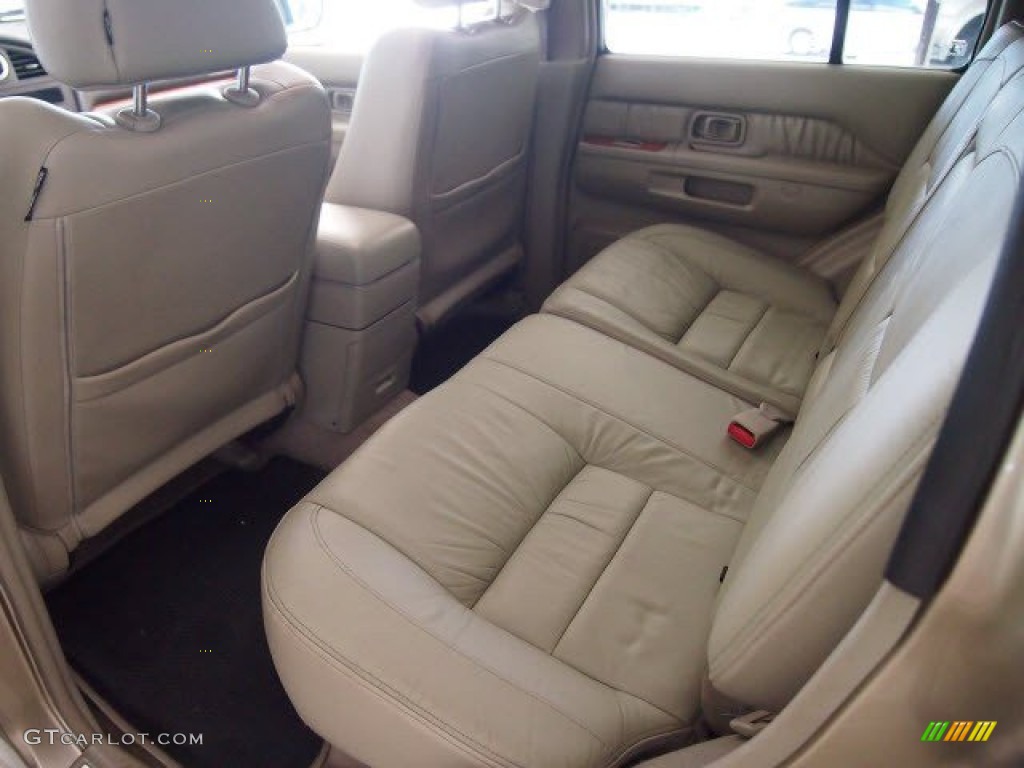 2002 QX4 4x4 - Golden Sand Metallic / Stone Beige photo #24