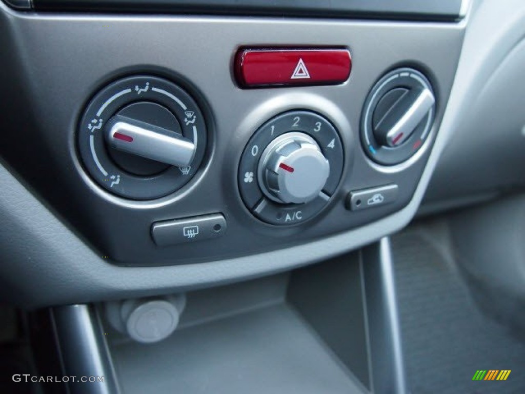 2010 Subaru Forester 2.5 X Premium Controls Photo #70095546
