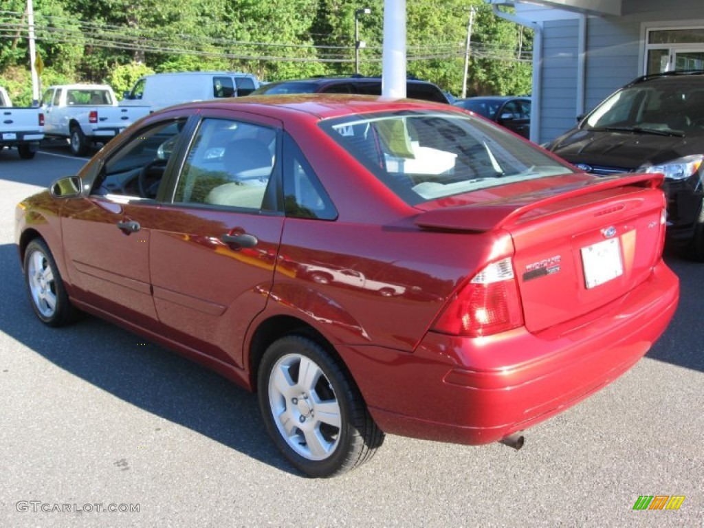 2005 Focus ZX4 SES Sedan - Sangria Red Metallic / Dark Flint/Light Flint photo #5