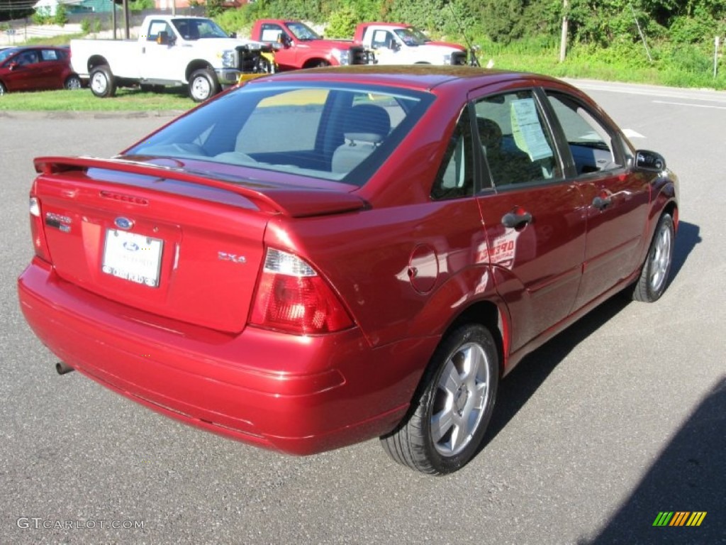 2005 Focus ZX4 SES Sedan - Sangria Red Metallic / Dark Flint/Light Flint photo #7