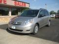 2010 Silver Shadow Pearl Toyota Sienna LE  photo #1