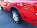 2009 Red Alert Nissan Titan PRO-4X Crew Cab 4x4  photo #4