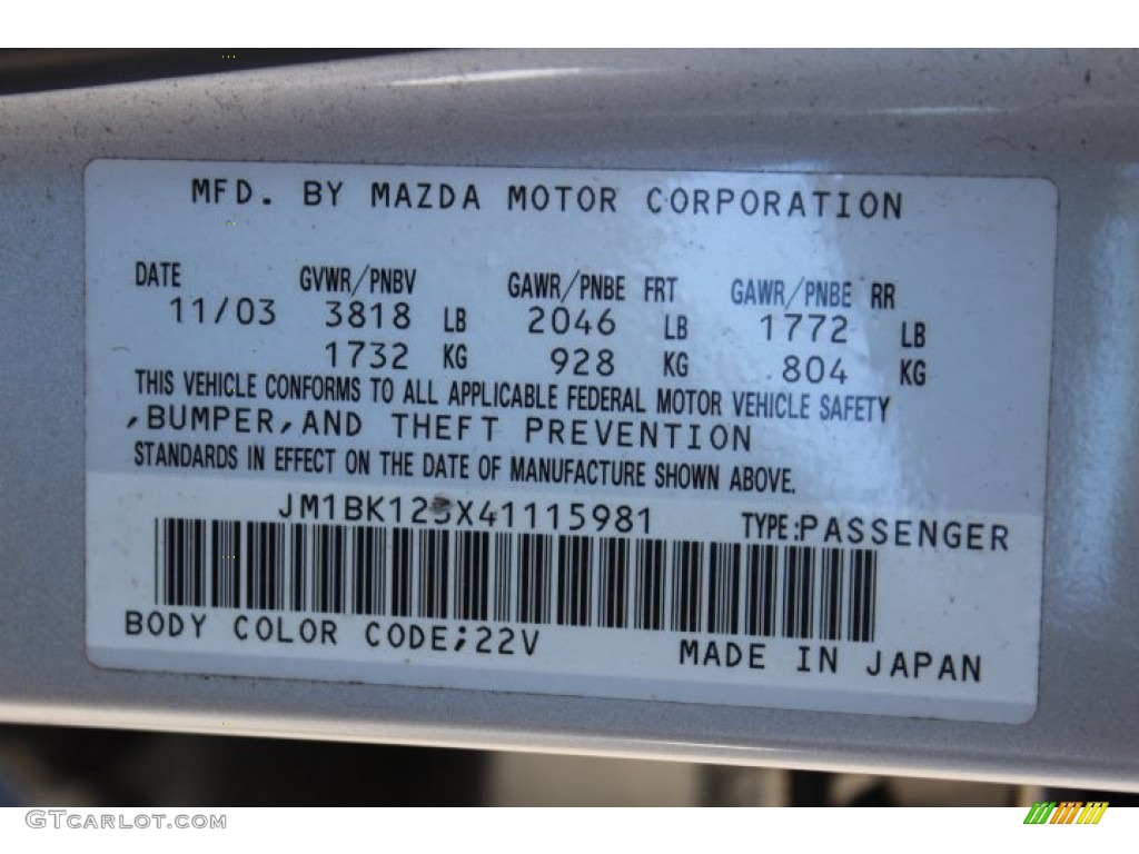 2004 MAZDA3 s Sedan - Sunlight Silver Mica / Black/Red photo #30
