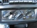 2002 Chrysler Sebring Black/Light Gray Interior Controls Photo