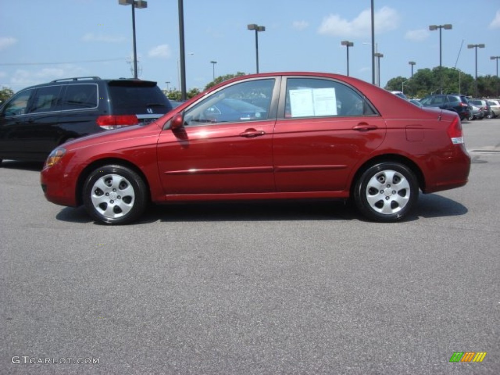 Spicy Red Metallic 2009 Kia Spectra EX Sedan Exterior Photo #70200532