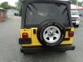 2004 Solar Yellow Jeep Wrangler Unlimited 4x4  photo #23