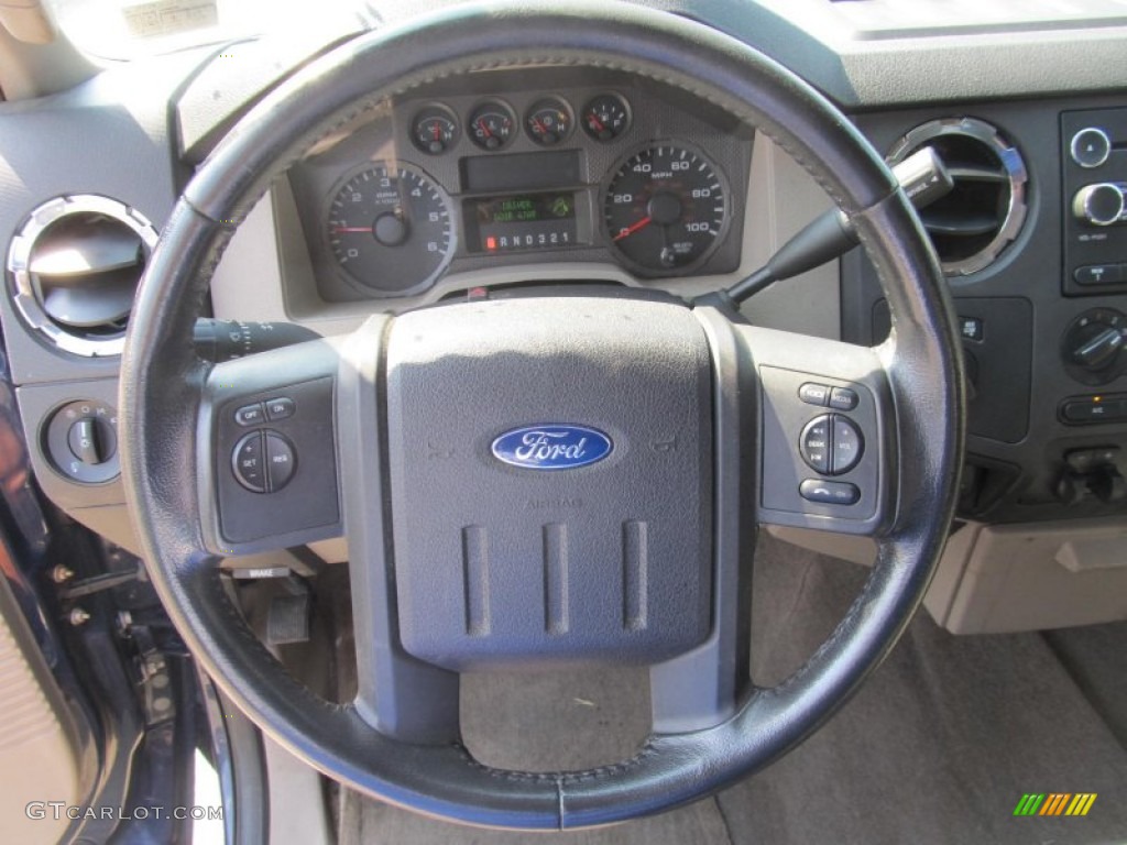 2009 Ford F250 Super Duty XLT SuperCab 4x4 Medium Stone Steering Wheel Photo #70261009