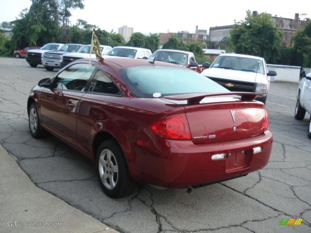 2009 G5  - Performance Red Tintcoat / Ebony photo #6