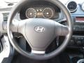 2006 Hyundai Tiburon Black Interior Steering Wheel Photo
