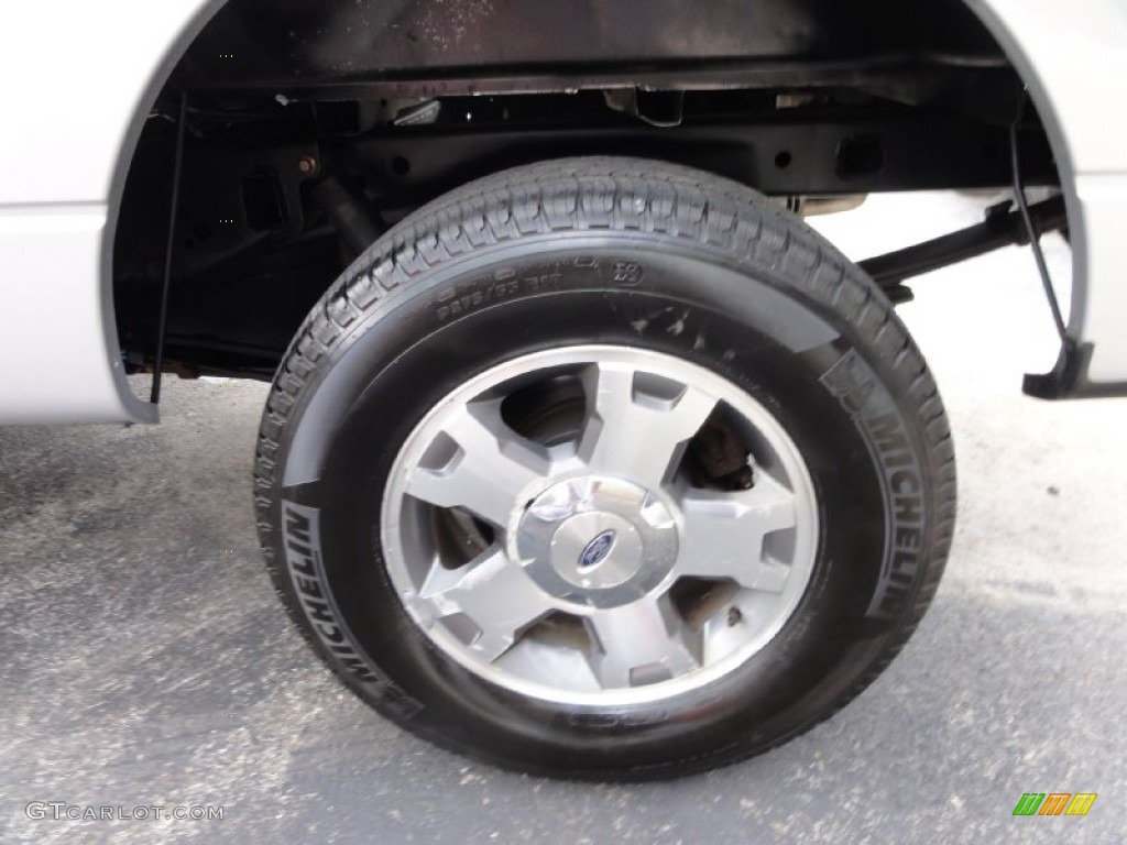 2010 Ford F150 STX SuperCab 4x4 Wheel Photo #70354689