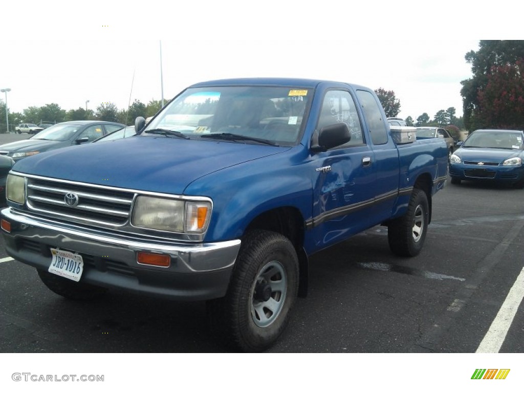 1995 T100 Truck DX Extended Cab 4x4 - Tropical Blue Metallic / Blue photo #2
