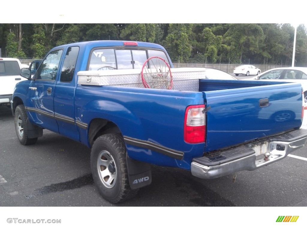 1995 T100 Truck DX Extended Cab 4x4 - Tropical Blue Metallic / Blue photo #4