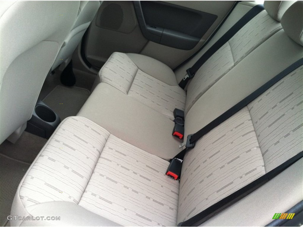 Medium Stone Interior 2010 Ford Focus SE Sedan Photo #70385211