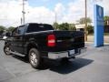 2004 Black Ford F150 Lariat SuperCrew  photo #28