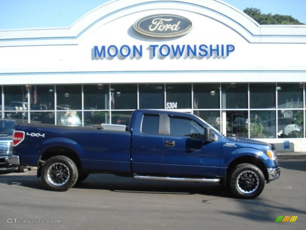 2010 F150 XLT SuperCab 4x4 - Dark Blue Pearl Metallic / Medium Stone photo #1