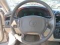 Neutral Shale Beige Steering Wheel Photo for 2003 Cadillac DeVille #70485659