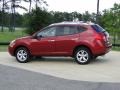 2010 Venom Red Nissan Rogue SL  photo #7