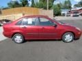 2004 Sangria Red Metallic Ford Focus LX Sedan  photo #3