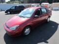 2004 Sangria Red Metallic Ford Focus LX Sedan  photo #10