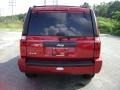 2009 Inferno Red Crystal Pearl Jeep Commander Sport 4x4  photo #5