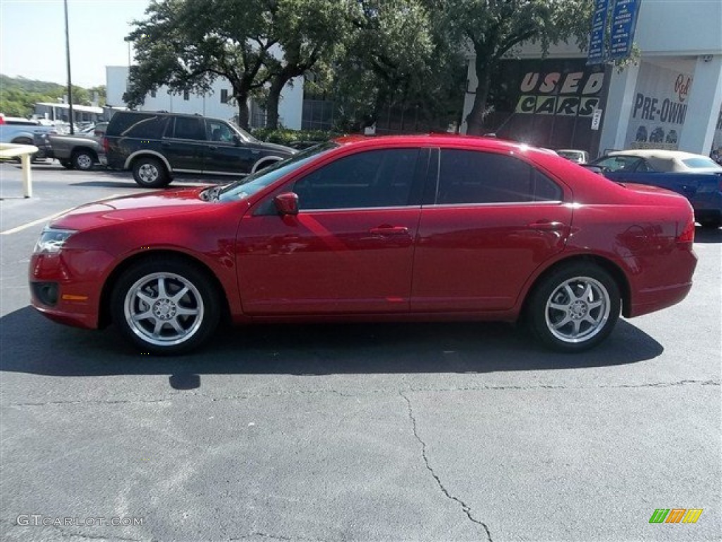 2010 Fusion SE - Red Candy Metallic / Charcoal Black photo #6