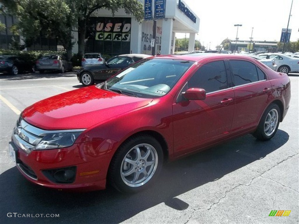 2010 Fusion SE - Red Candy Metallic / Charcoal Black photo #7